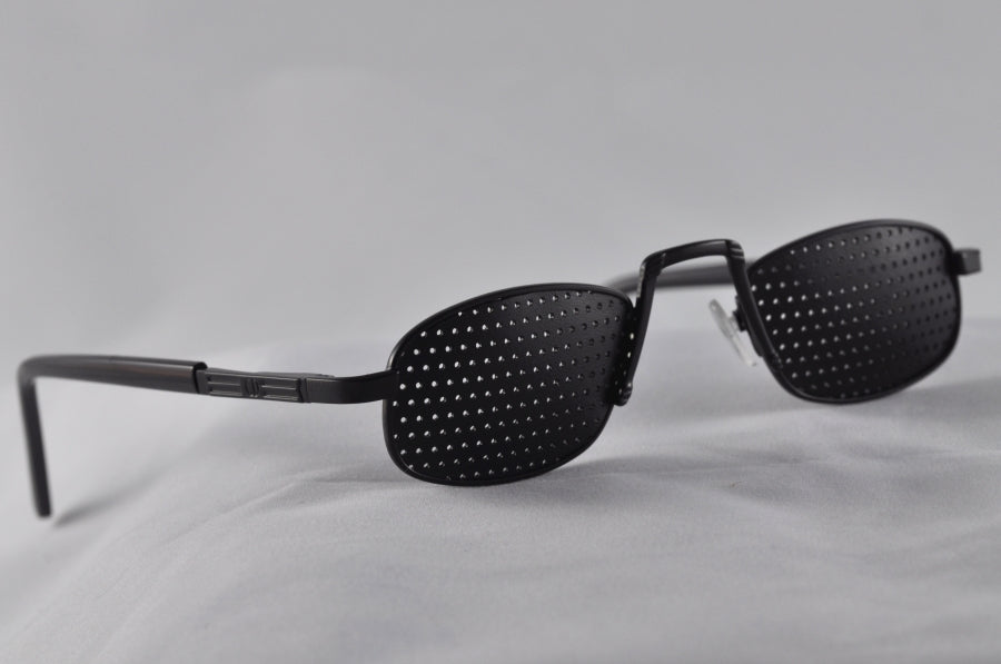 Reading Glasses with Small Conical Holes - New Zeland