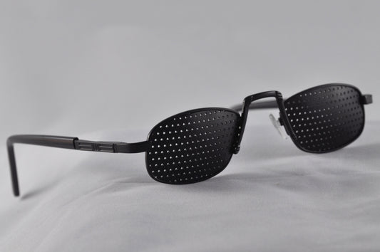 Reading Glasses with Small Conical Holes - New Zeland